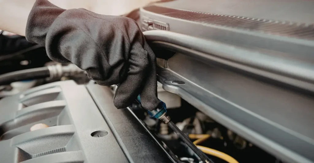 What are the symptoms of a clogged catalytic converter?